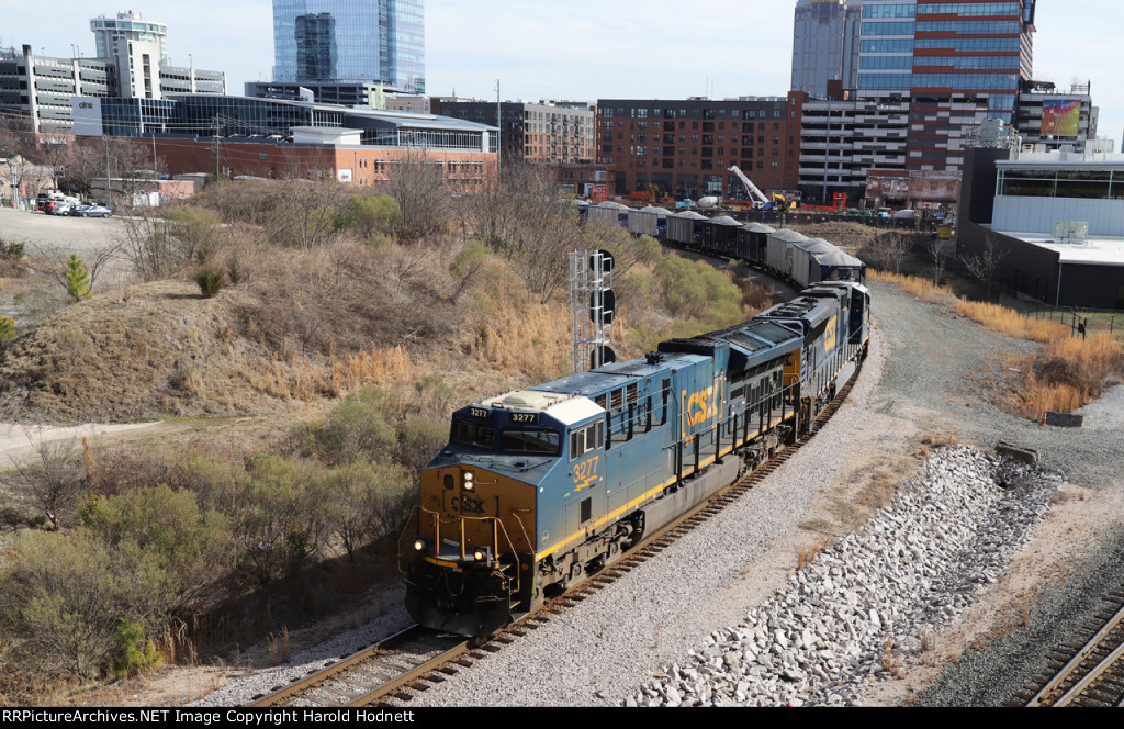 CSX 3277 leads train L619-08 past the signal at Raleigh Tower